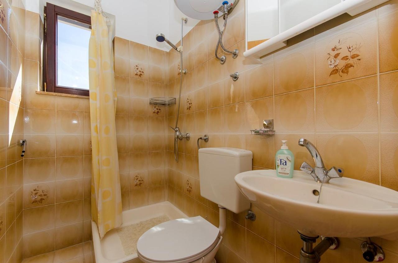 Apartments Goran Постира Экстерьер фото