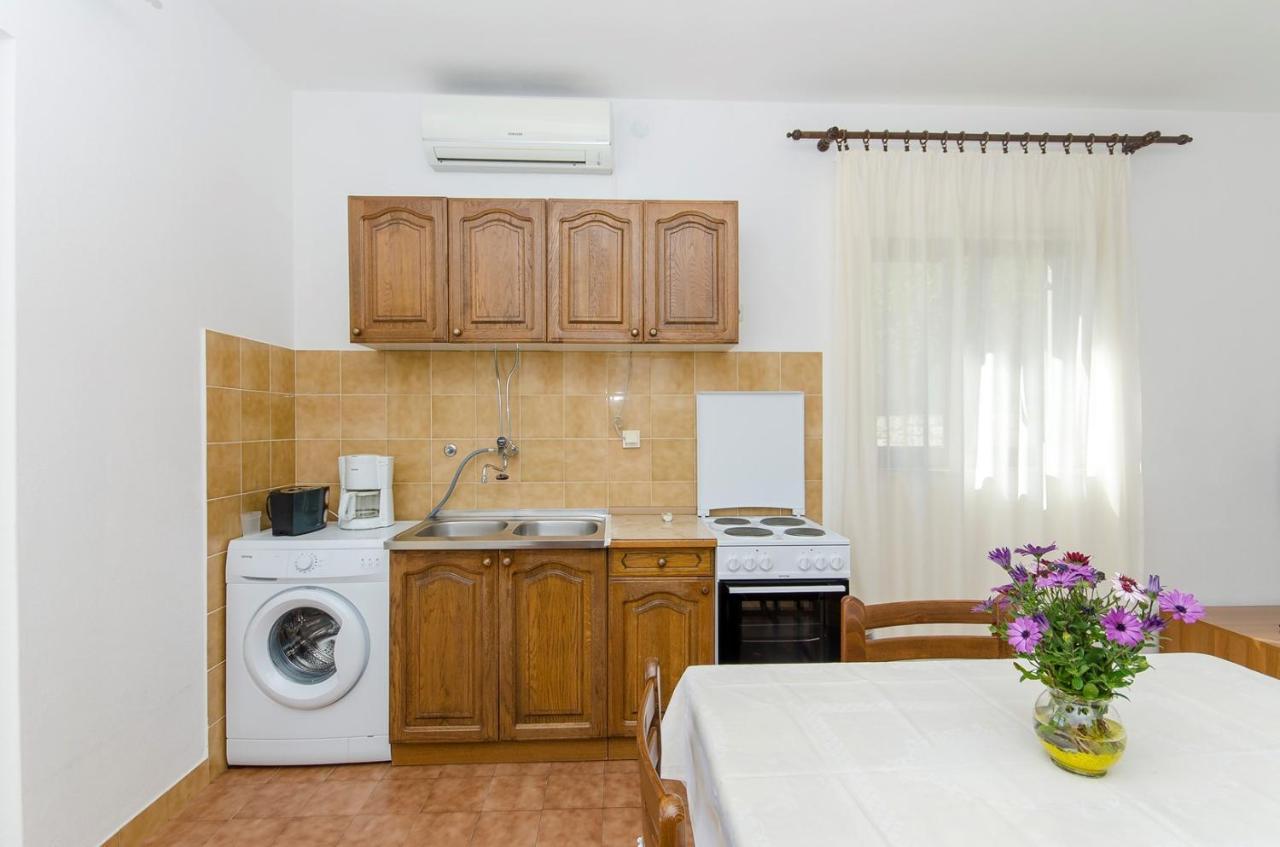 Apartments Goran Постира Экстерьер фото