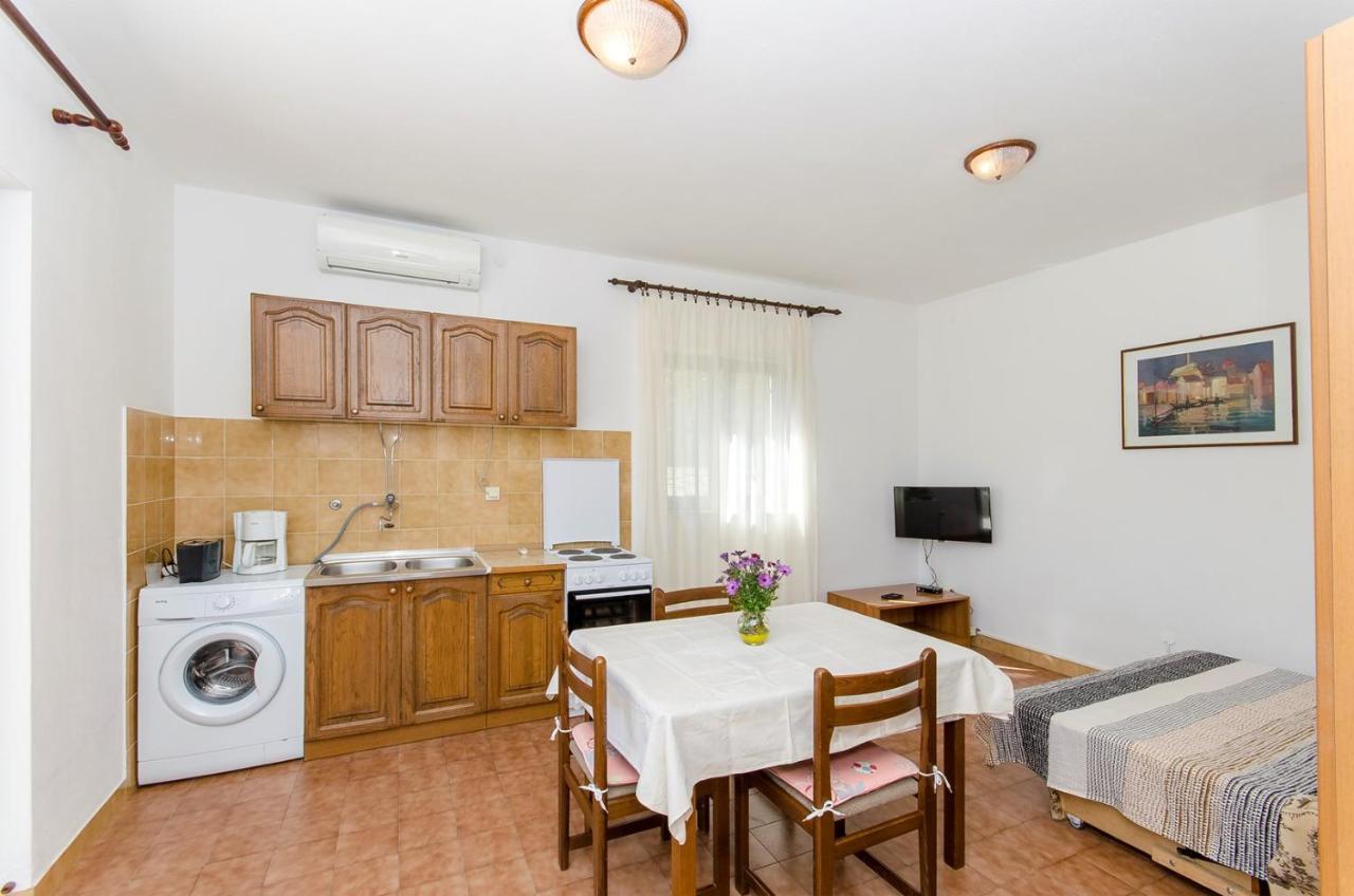 Apartments Goran Постира Экстерьер фото